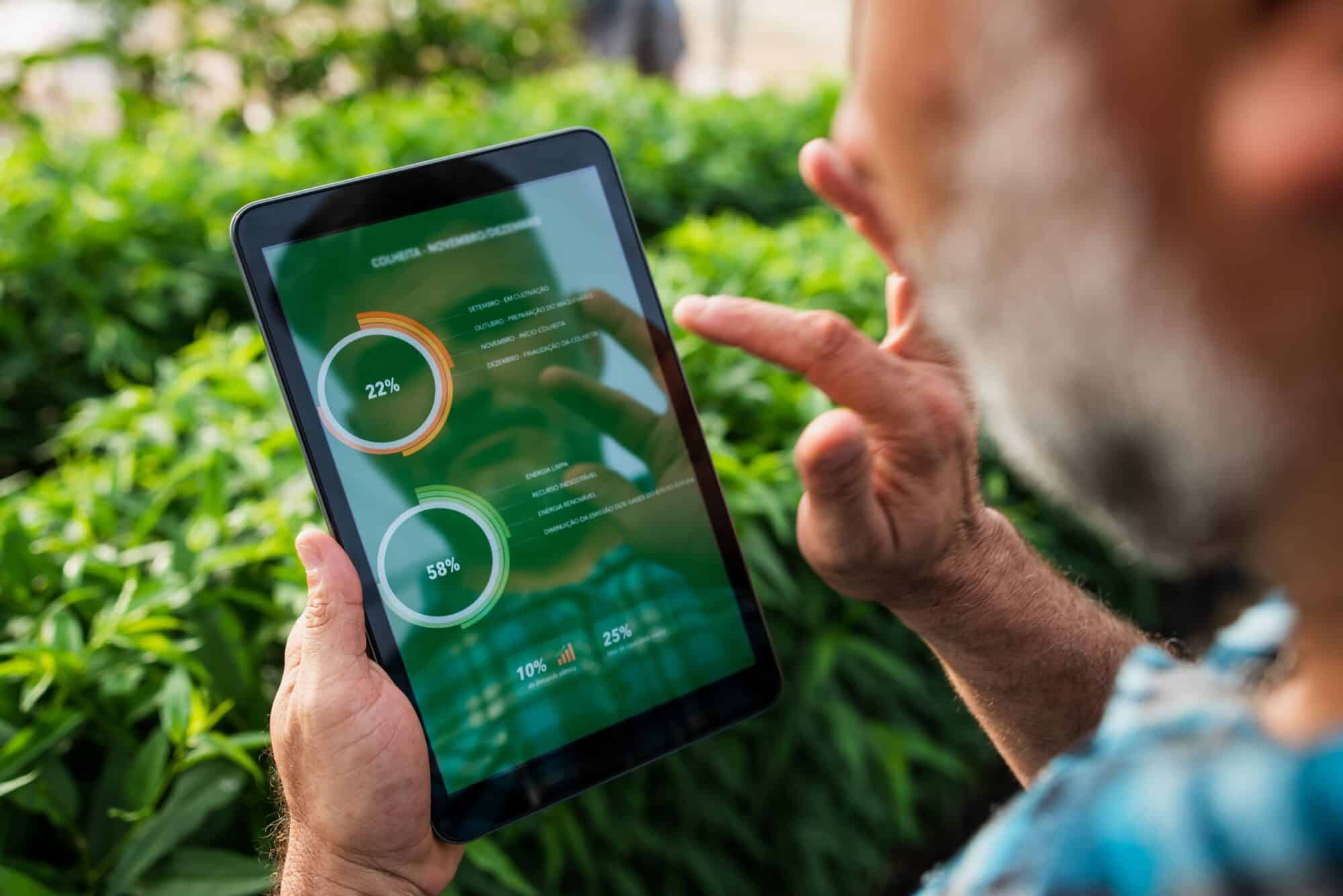 A man looks at a review dashboard.