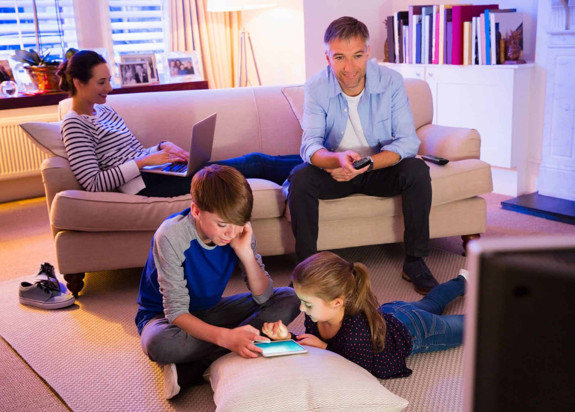 A family using the internet on different devices.