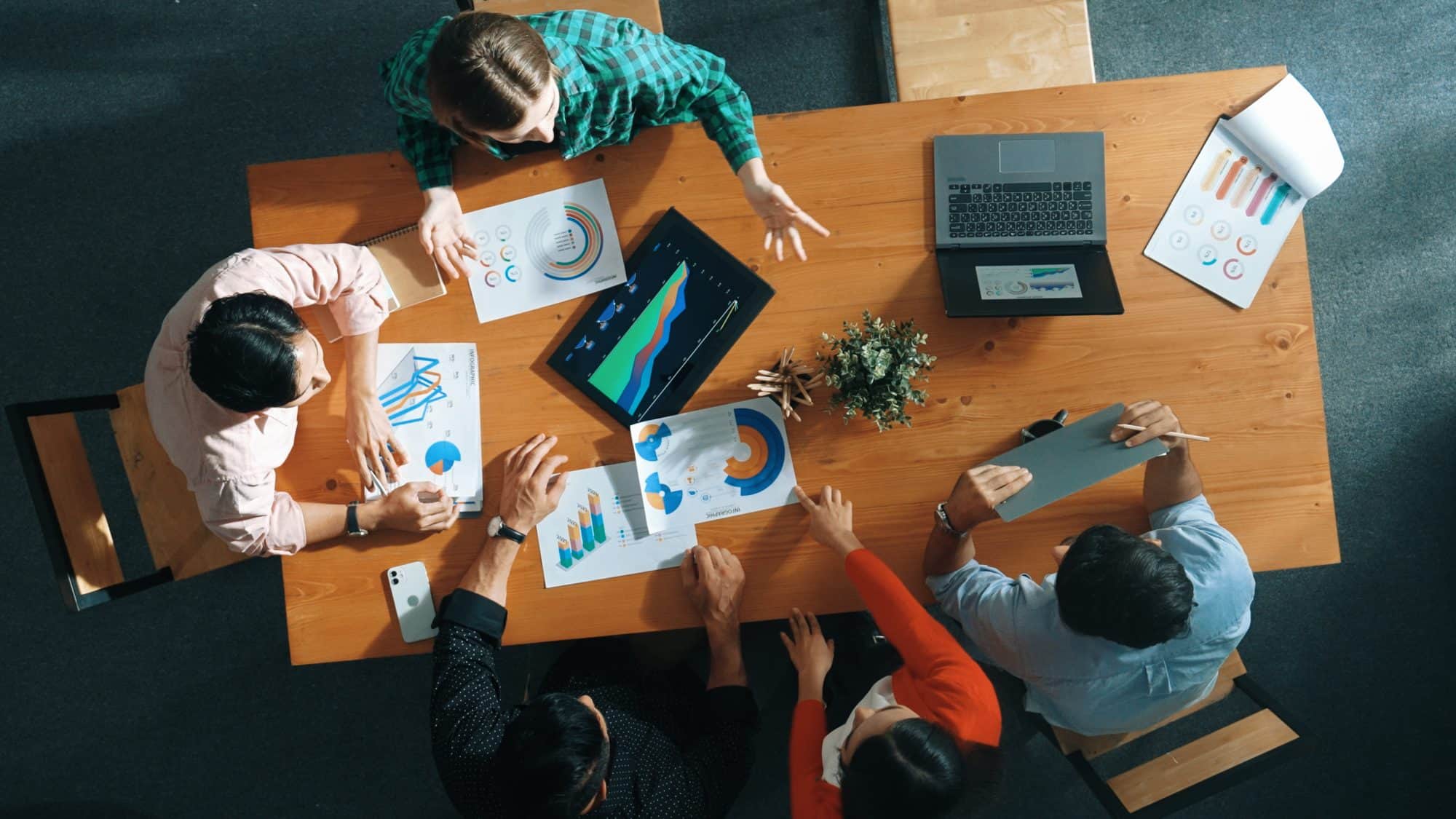 A team reviewing the budget for a startup business.